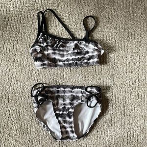 Gently used black and white child two piece bathing suit